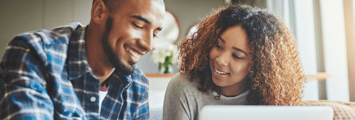 couple looking at computer
