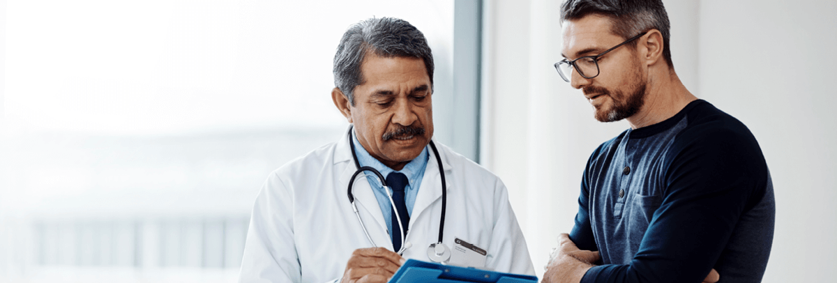 male doctor with male patient