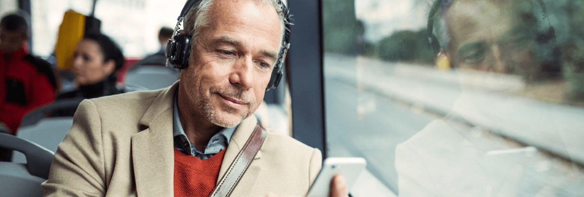 man commuting on train